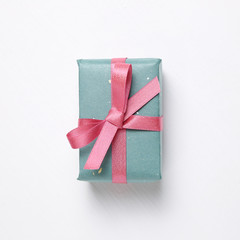 Green gift box isolated on white background