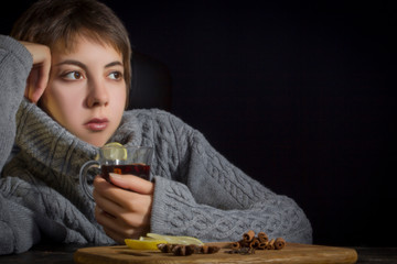 Young woman with hot drink