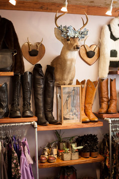Cowboy boots on shelves  