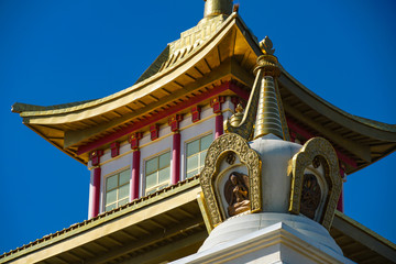 The upper level of the golden cloister of Buddha Shakyamuni in the city of Elista. On the seventh level of this largest Buddhist temple in Europe, there is a hall  confessors perform meditations