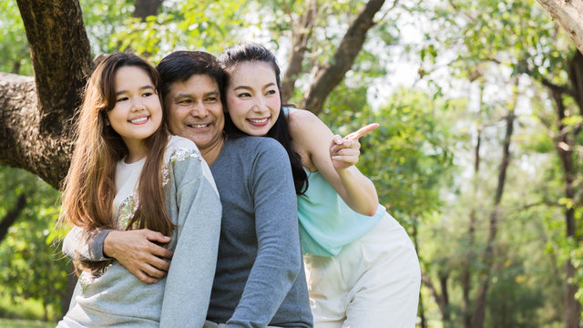 A happy family seeing a nature in the garden