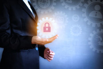 The concept of technology icon business. Business woman working with virtual screen of internet data security and safety is lock computer construction in company.