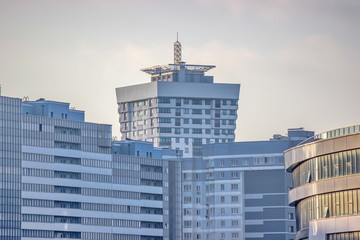 modern multi-storey building, skyscraper. construction of a glass house. a large number of residential and commercial areas. Urban city