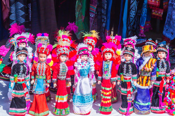 Colorful tribal dolls for sale to the tourist as the souvenir at the local market in Chiang Rai, the northern part of Thailand.