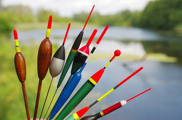Fishing floats on the background of the river © yrafoto