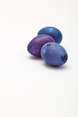 blue Easter eggs on white background