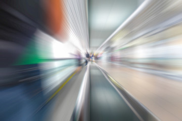 Blurred in motion background on traveler at the airport