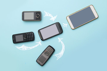 evolution of cell phones. Technology development telephone and pda concept. Vintage and new phones....