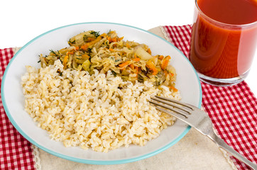 Vegetarian healthy food. Braised cabbage with carrots, brown rice.