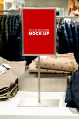 Mock up signboard stand at shop clothing