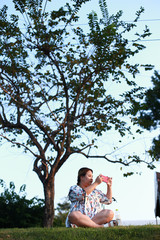 Fototapeta premium portrait of happy fat women in nature
