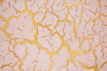 decorative plaster imitating cracks on the surface