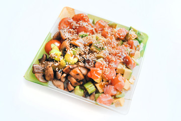 Poke bowl of rice with avocado, mushrooms and salmon