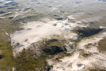Dutch dunes by the sea from above in mystical late afternoon sun