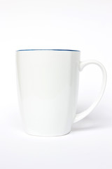 White ceramic mug isolated on white background