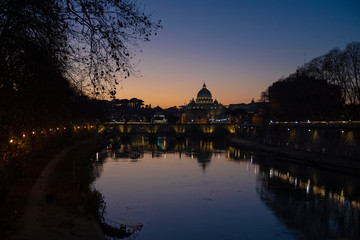 Fototapeta na wymiar view from the tiber river of St. Peter's Basilica at sunset, Vatican, Rome, Italy