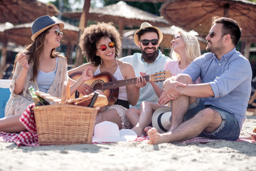 Friends having fun on the beach
