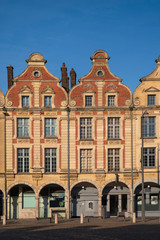 Fototapeta na wymiar Facades of typical Flemish medieval houses in a square of Arras in France
