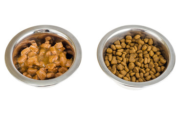 Metal bowls with various pet food.