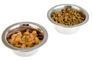 Metal bowls with various pet food.