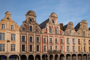Facades of typical Flemish medieval houses in a square of Arras in France