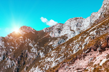 Beautiful Mountain Landscape, Spain, Picos de Europa, rocks and teal sky with white cloud