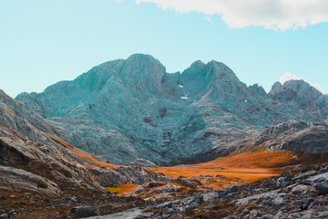 Beautiful Mountain Mars Fantastic Landscape, rocks and teal sky with white cloud