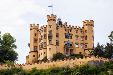 Schloss Hohenschwangau castle in the Alpine mountains