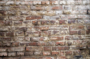 Dirty old painted brick wall