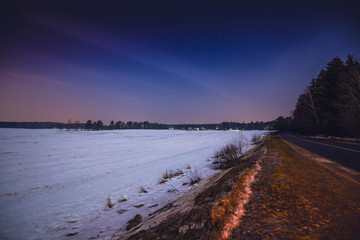 Night countryside landscape on full moon.
