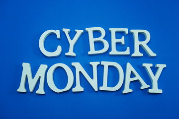 Fototapeta na wymiar Cyber Monday Sale alphabet letters on blue background business concept