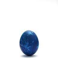 Decorated Blue Easter egg on white background