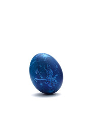 Decorated Blue Easter egg on white background