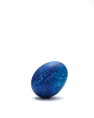 Decorated Blue Easter egg on white background