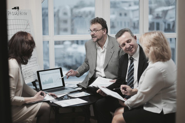 successful business partners discussing a new contract