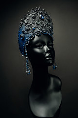 Mannequin head in dark silver blue headwear kokoshnik