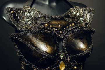 Gorgeous golden corset with precious stones