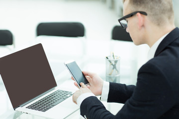 businessman planning a travel with a laptop,