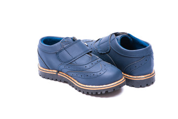 Blue baby shoes isolated on white background