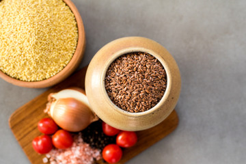 Superfood, groats & seeds, a healthy mix for healthy lifestyle on stone neutral background