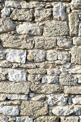 Old relief ecru limestone wall