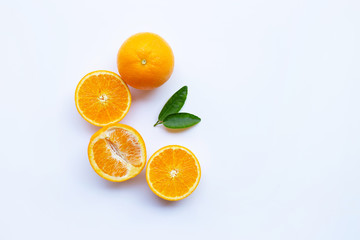 High vitamin C. Fresh orange citrus fruit with leaves isolated on white