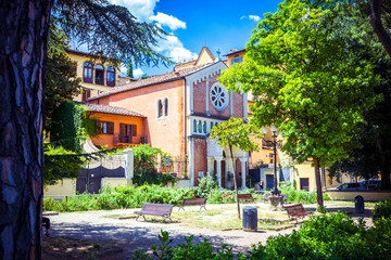 Lutheran church (Chiesa Luterana) around green trees, Florence, Tuscany, Italy