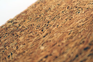 A slice of pressed tobacco that grows in Indonesia.