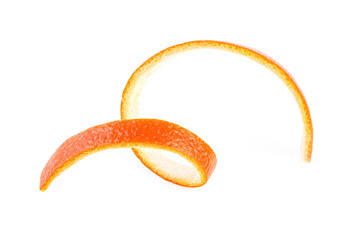 Single orange peel on a white background