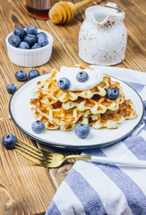 Fresh homemade waffles with blueberries for breakfast
