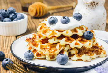Fresh homemade waffles with blueberries for breakfast