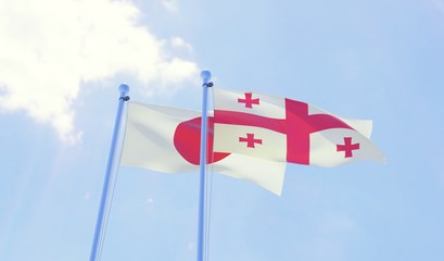 Japan and Georgia, two flags waving against blue sky. 3d image