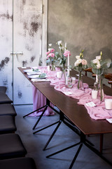 Beautiful fresh flowers champagne glasses at wedding ceremony aisle closeup