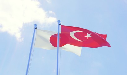 Japan and Turkey, two flags waving against blue sky. 3d image